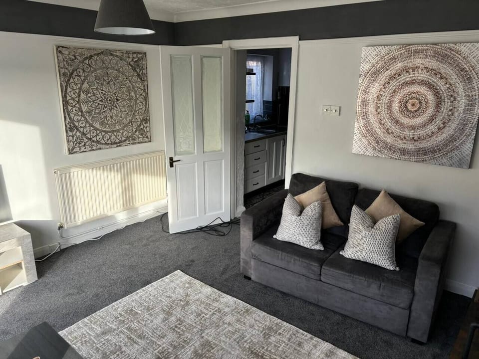 Relax and entertain in style. Book your stay and enjoy the ultimate living room experience! (3)