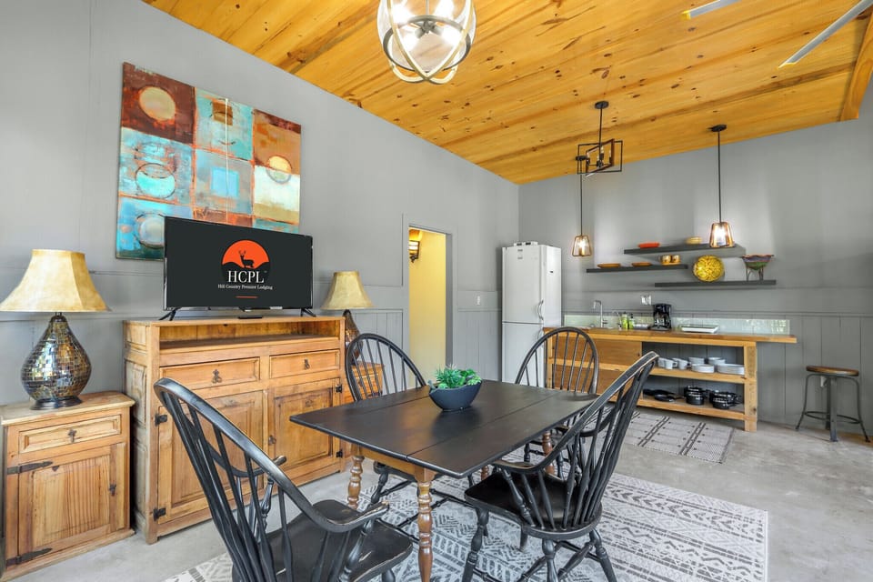 The kitchenette is behind the dining