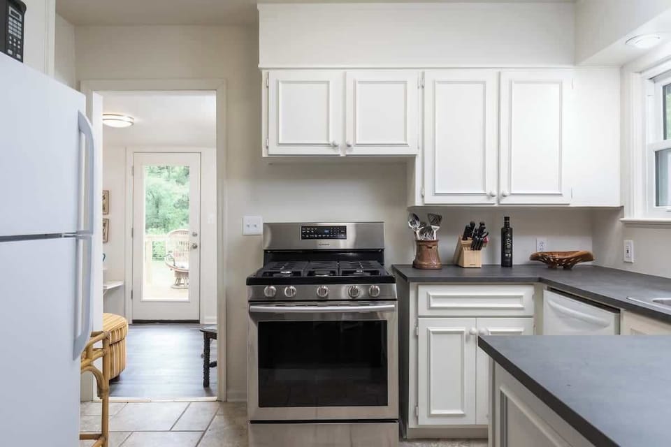 Kitchen open to Sunroom and dining