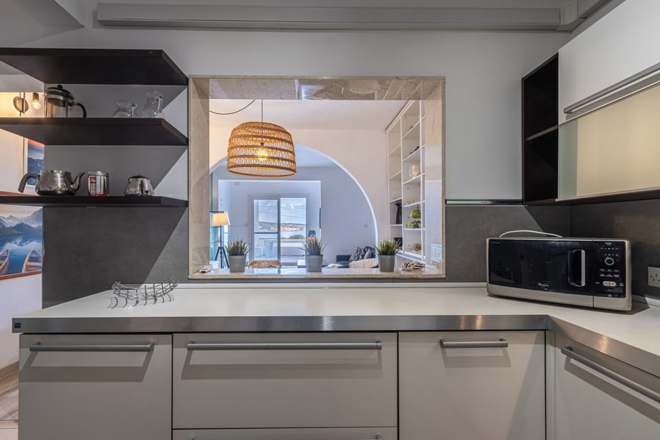 Kitchen leading onto the dining room and lounge