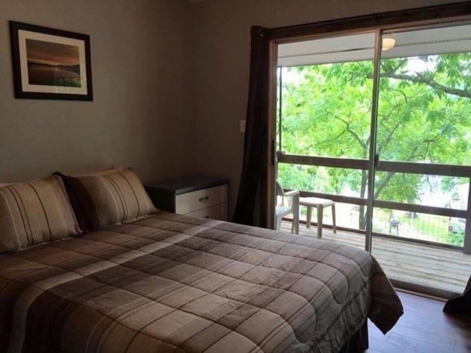Two bedrooms each with a queen bed