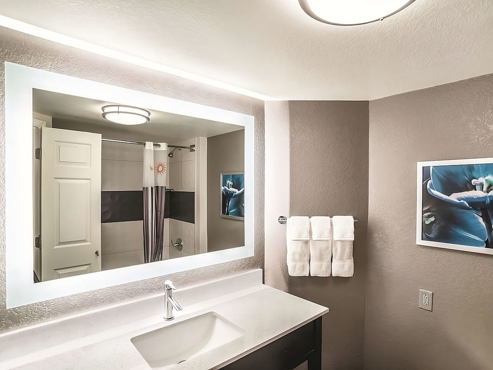 Get ready effortlessly at the bright vanity with flattering lighting.