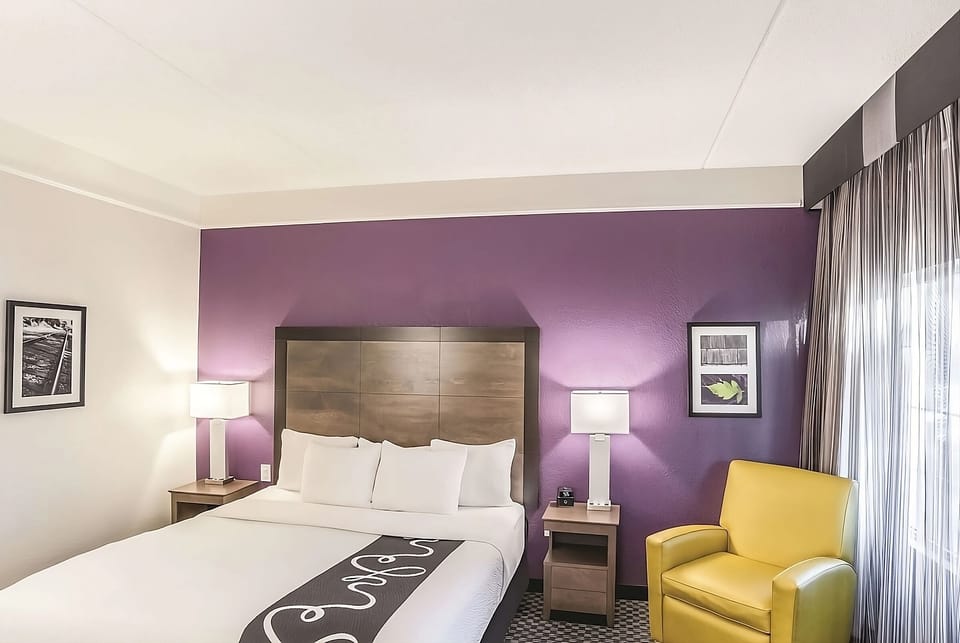 Drift off surrounded by soothing colors and hotel-fresh linens.