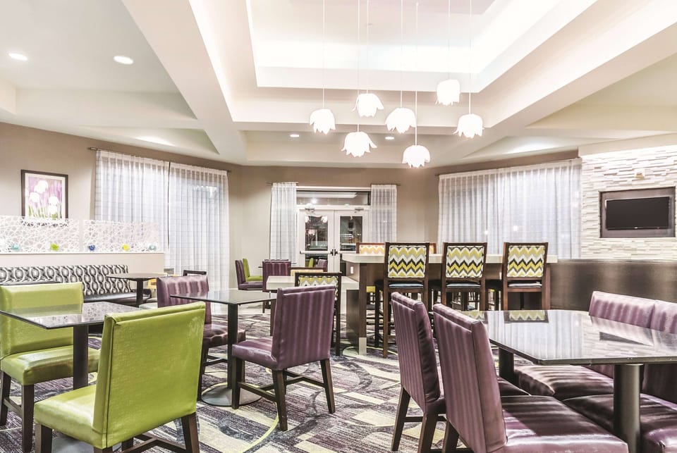 Unwind in the airy lobby with stylish seating and glow.