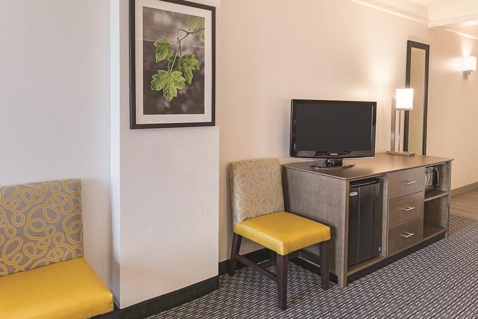 Kick back with in-room entertainment and convenient mini-fridge access.