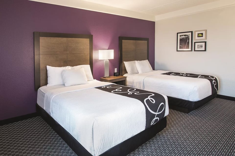Settle into a spacious double-queen room made for sharing.