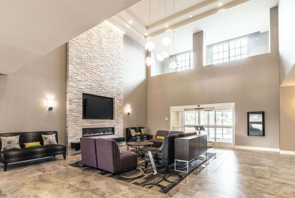 Breathe in the soaring, sunlit lobby designed for relaxing.