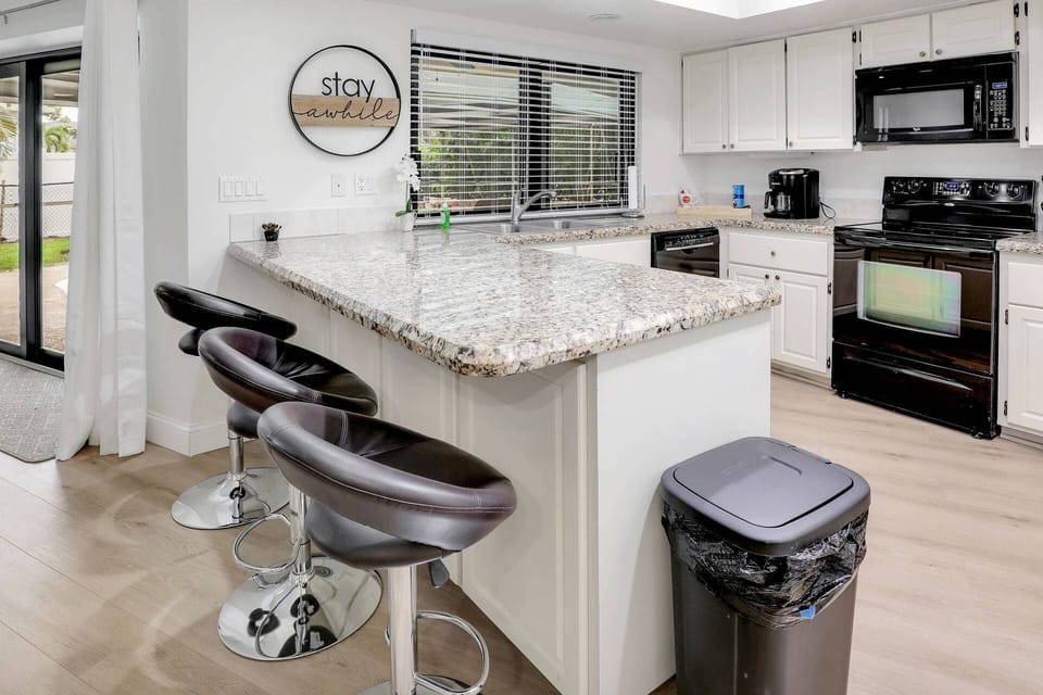 The breakfast bar is great for overflow seating and to watch the chef in action.