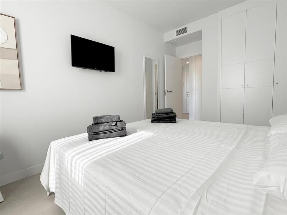 More pictures of the bedroom equipped with spacious built-in wardrobe