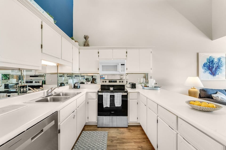 The kitchen affords you a ton of prep space and counter space for laying out appetizers and eating dinner!