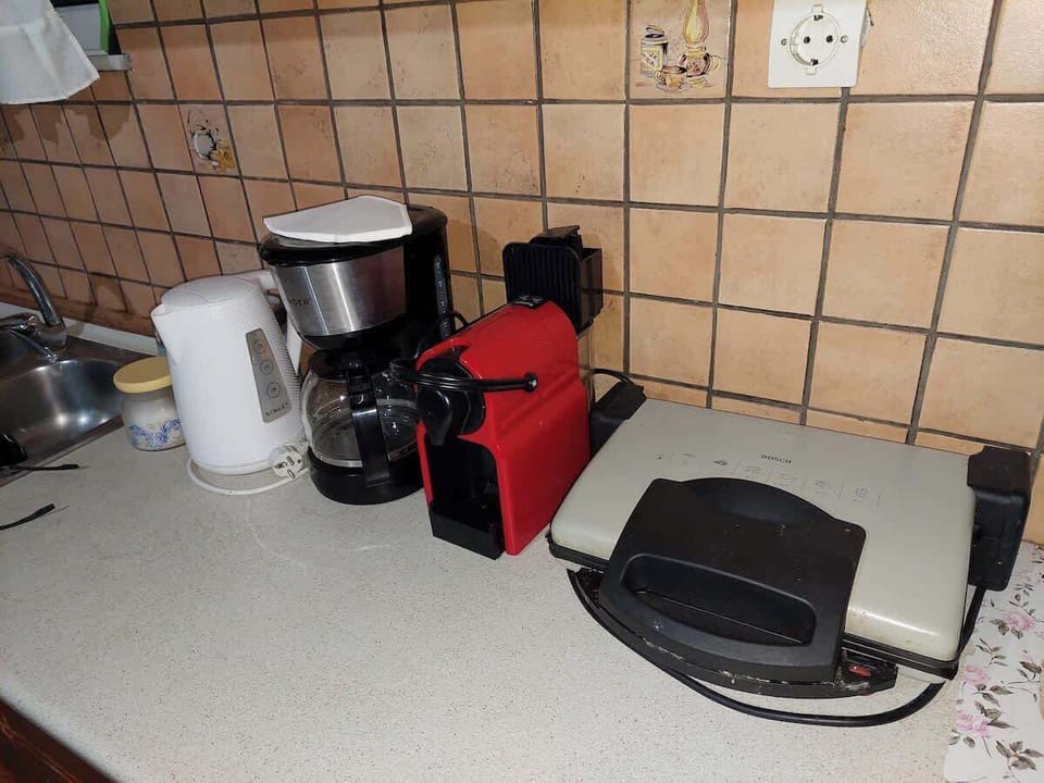 Breakfast Station – Convenient setup with coffee maker and essentials for your morning routine.