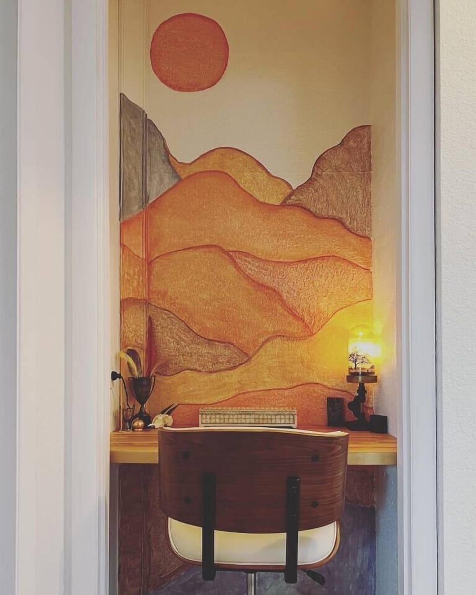 Built-in desk with computer and electronic charging station.  Hand painted mural. 