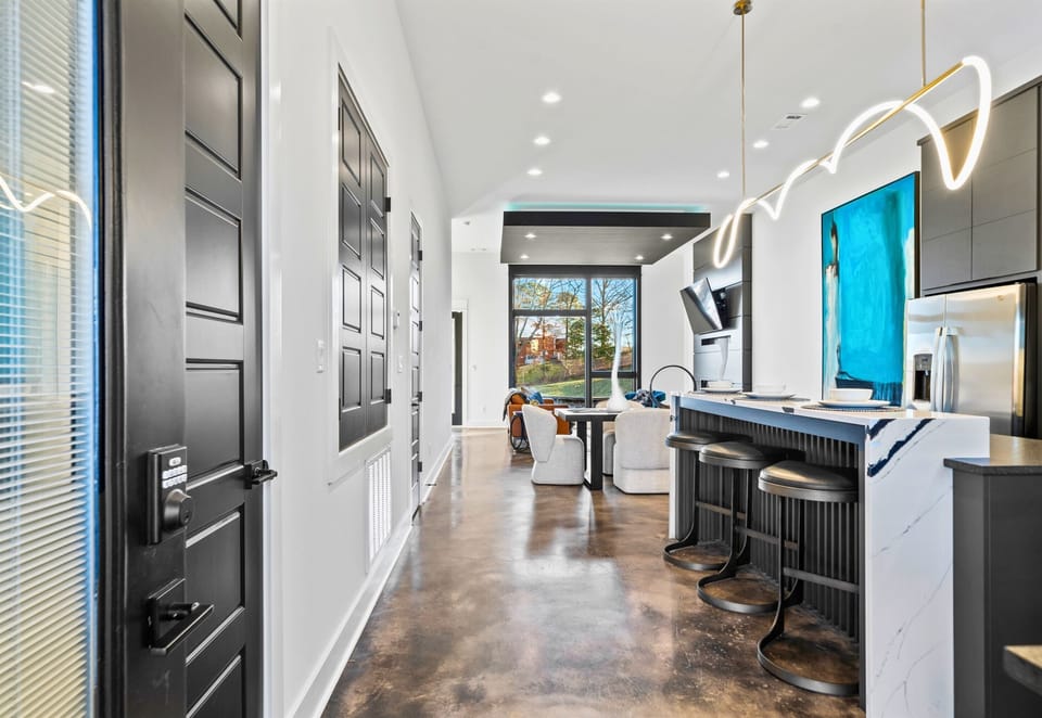 A welcoming entryway leads you into the heart of the home, offering a seamless blend of style, comfort, and thoughtful design.