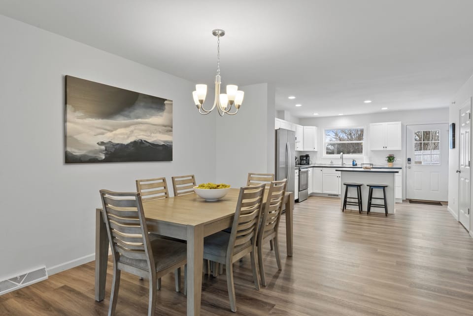Dining room open to kitchen. Seating for 6.