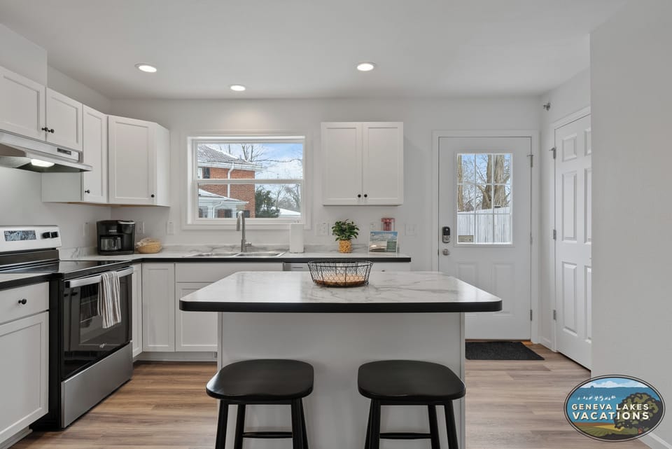 Large area for cooking and congregating with easy access to the back yard.