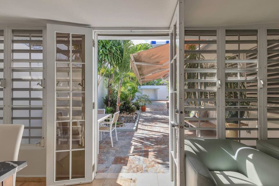 Doors from living room to courtyard