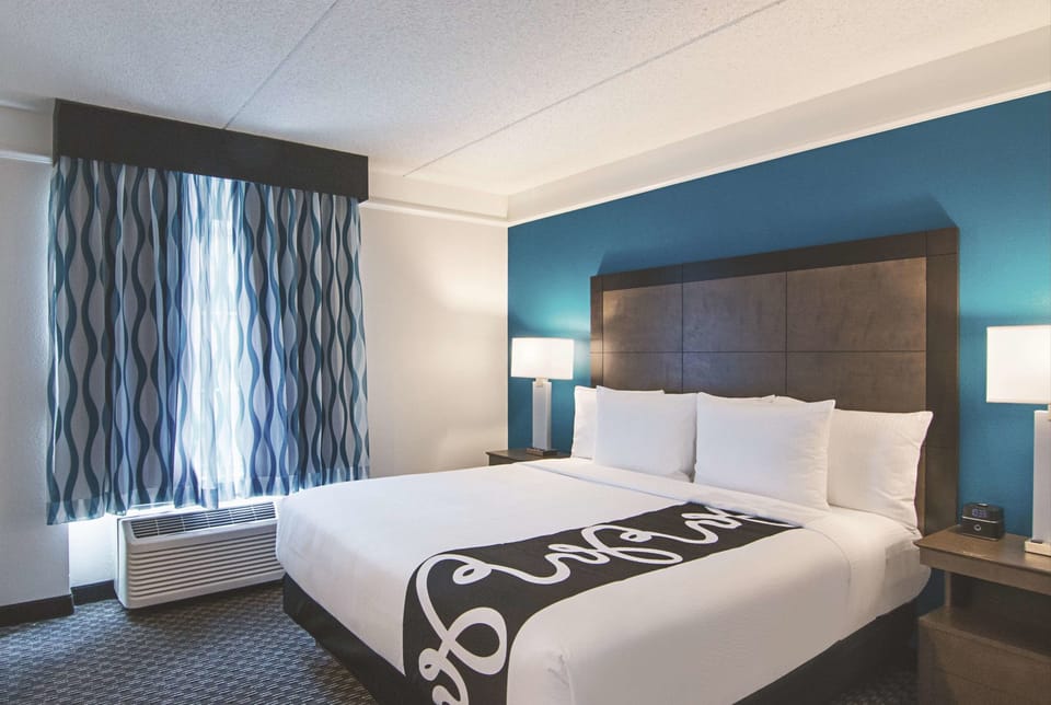 Stretch out on the crisp king bed and relax.