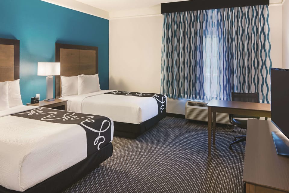 Settle into two plush queens for a restful night.