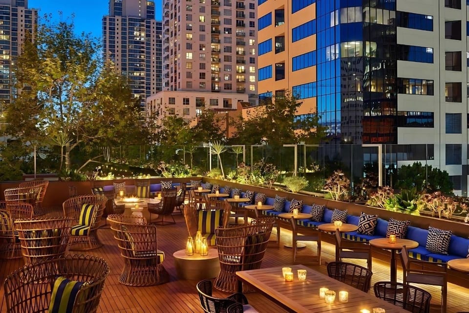 Unwind under city lights on the stylish rooftop lounge.