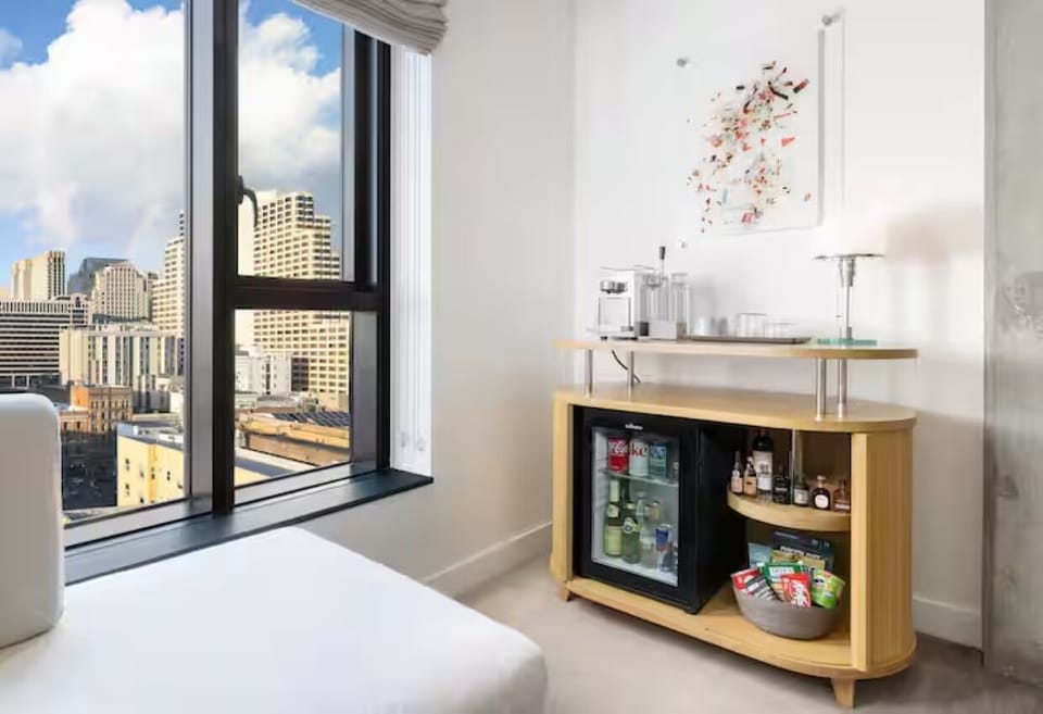 Start your day with coffee beside sweeping city views.