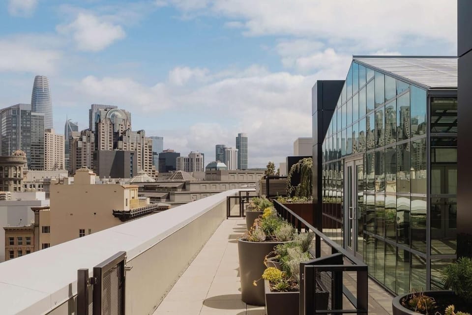 Breathe in skyline views along a breezy rooftop walkway.