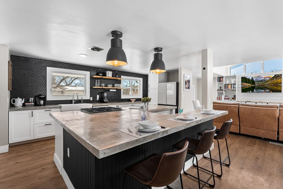 The kitchen island is huge and even comes with additional seating!