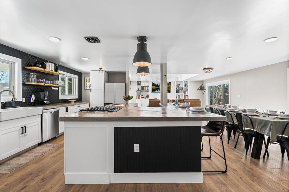 The brand new concrete countertops give the kitchen a modern touch