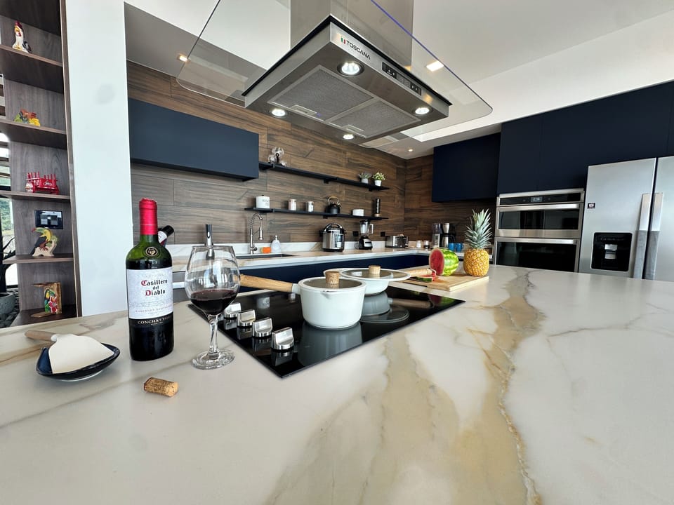 The kitchen has all you need-cookware, utensils, blender, toaster & more.