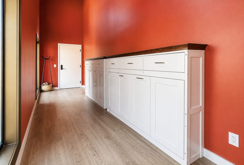 Entry hallway features two twin murphy beds for extra sleeping space
