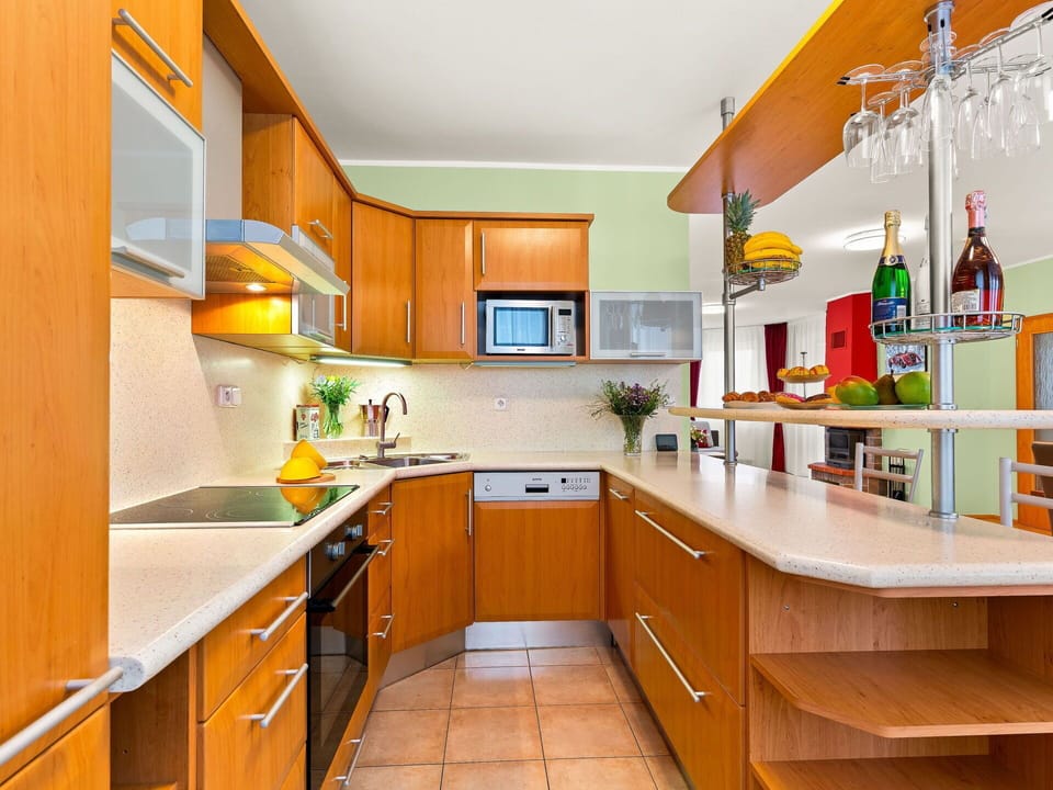 Kitchen, Cabinetry, Kitchen Appliance, Countertop, Furniture, Interior Design, Wood, Major Appliance, Flooring, Home