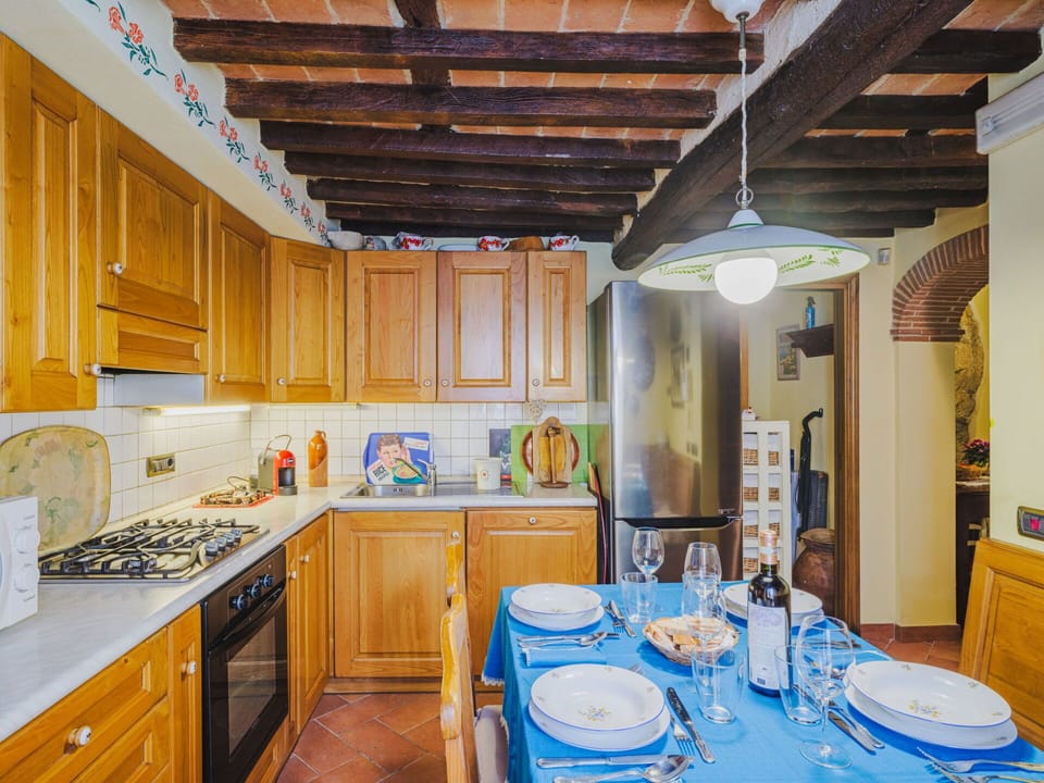 Furniture, Interior Design, Wood, Flooring, Ceiling, Room, Floor, Countertop, Kitchen, Table