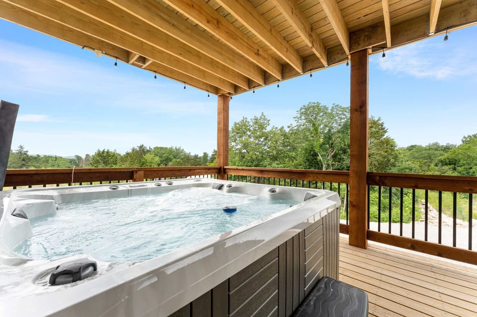 Relax in a private hot tub on the back deck!