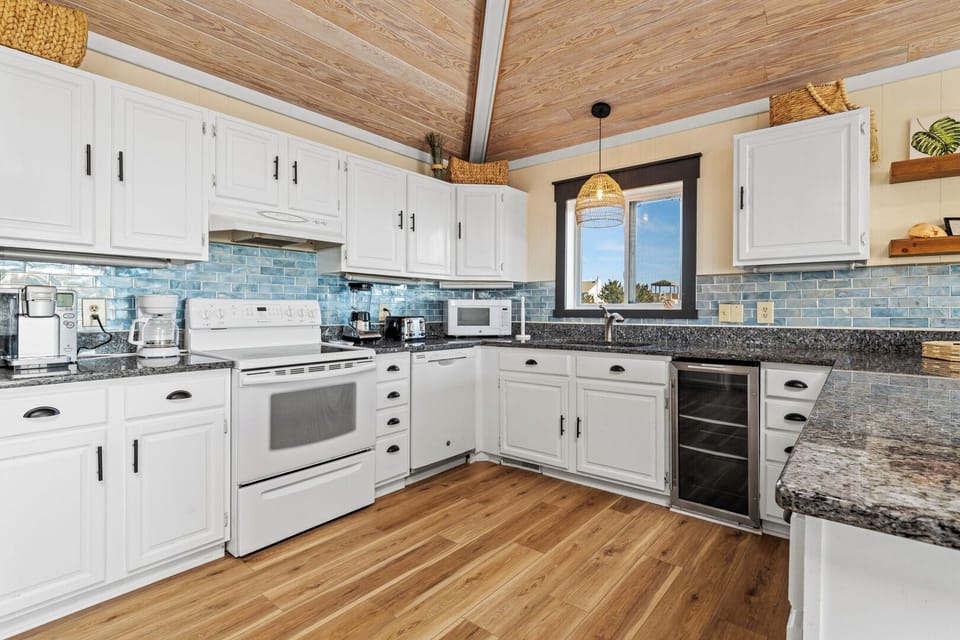 Kitchen Area with Bar Seating on Third Level