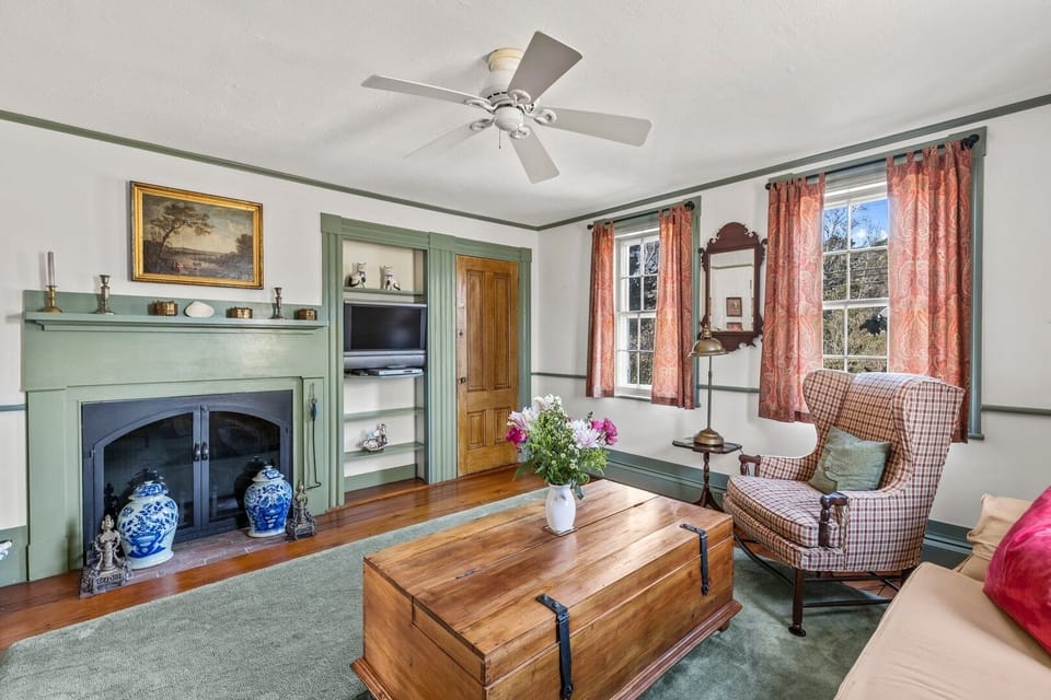 Living Room with Fireplace and Ceiling Fan