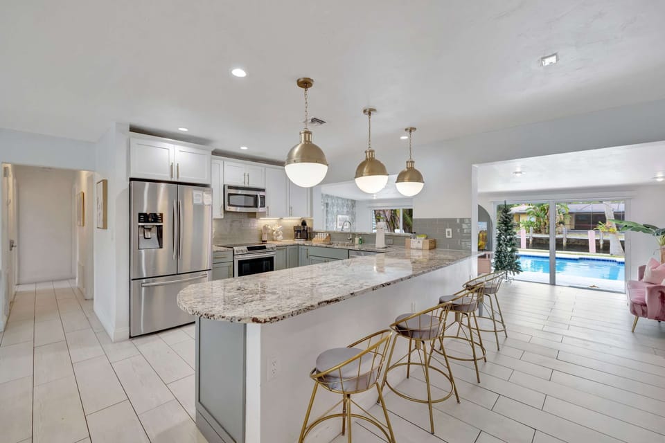 The airy, open kitchen offers ample space & all the comforts of home