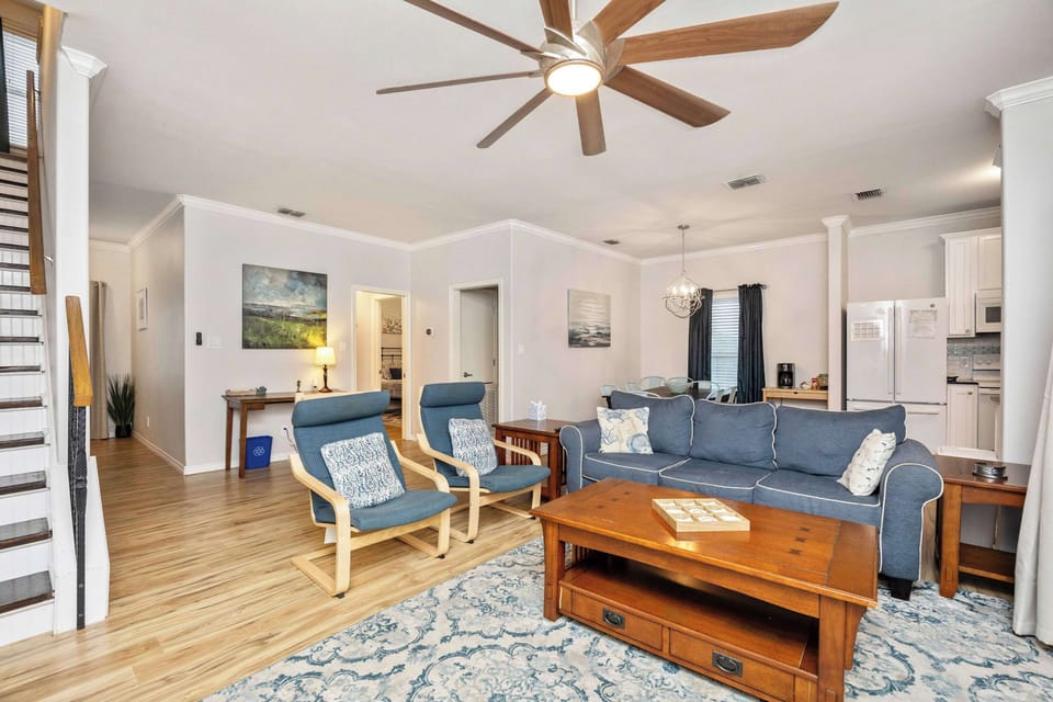 Bright living area with sofa and Smart TV