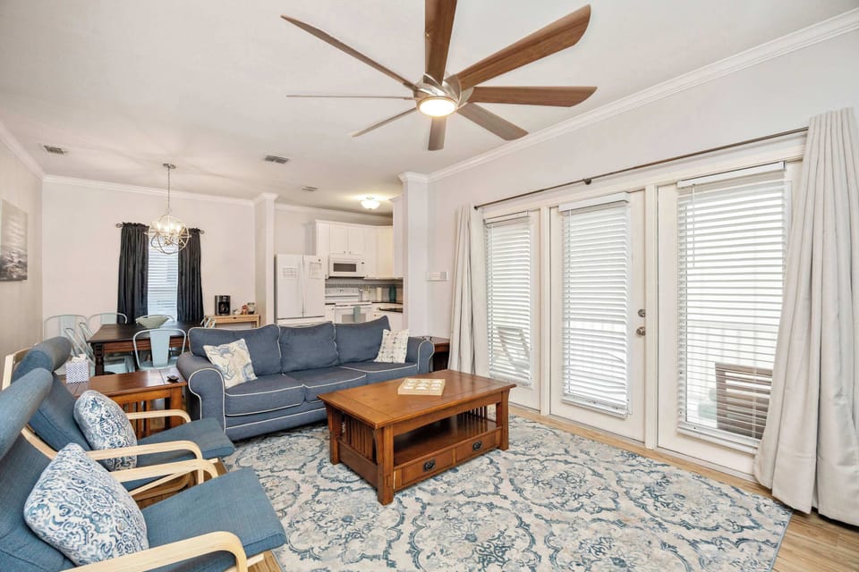 Bright living area with sofa and Smart TV