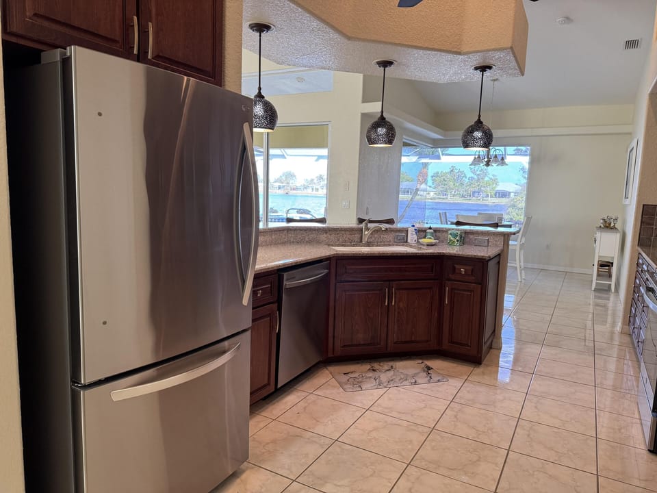 Bright, fully-equipped kitchen with plenty of counter space and new appliances