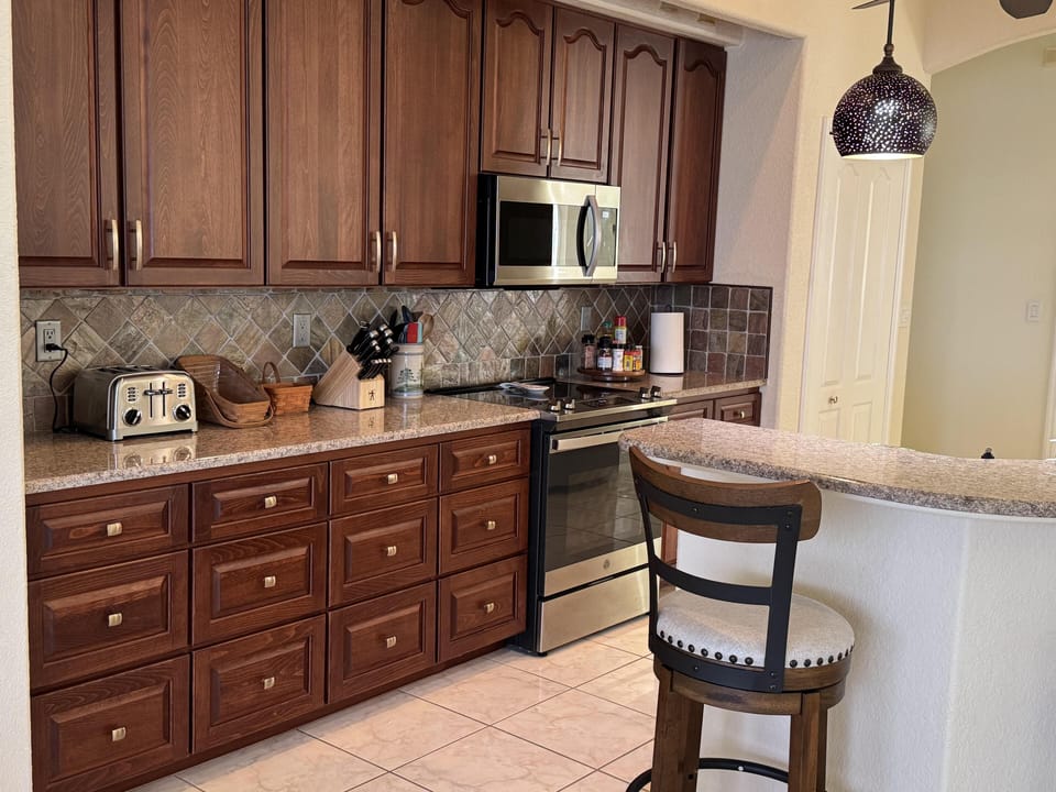 Bright, fully-equipped kitchen with plenty of counter space and new appliances