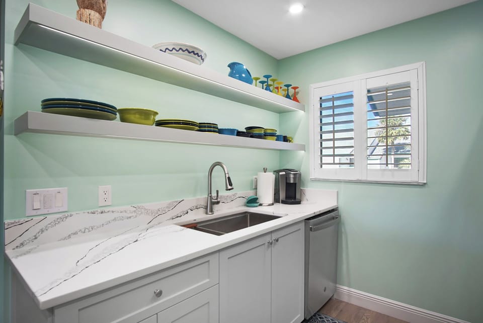 Open shelving makes for easy access to dishware