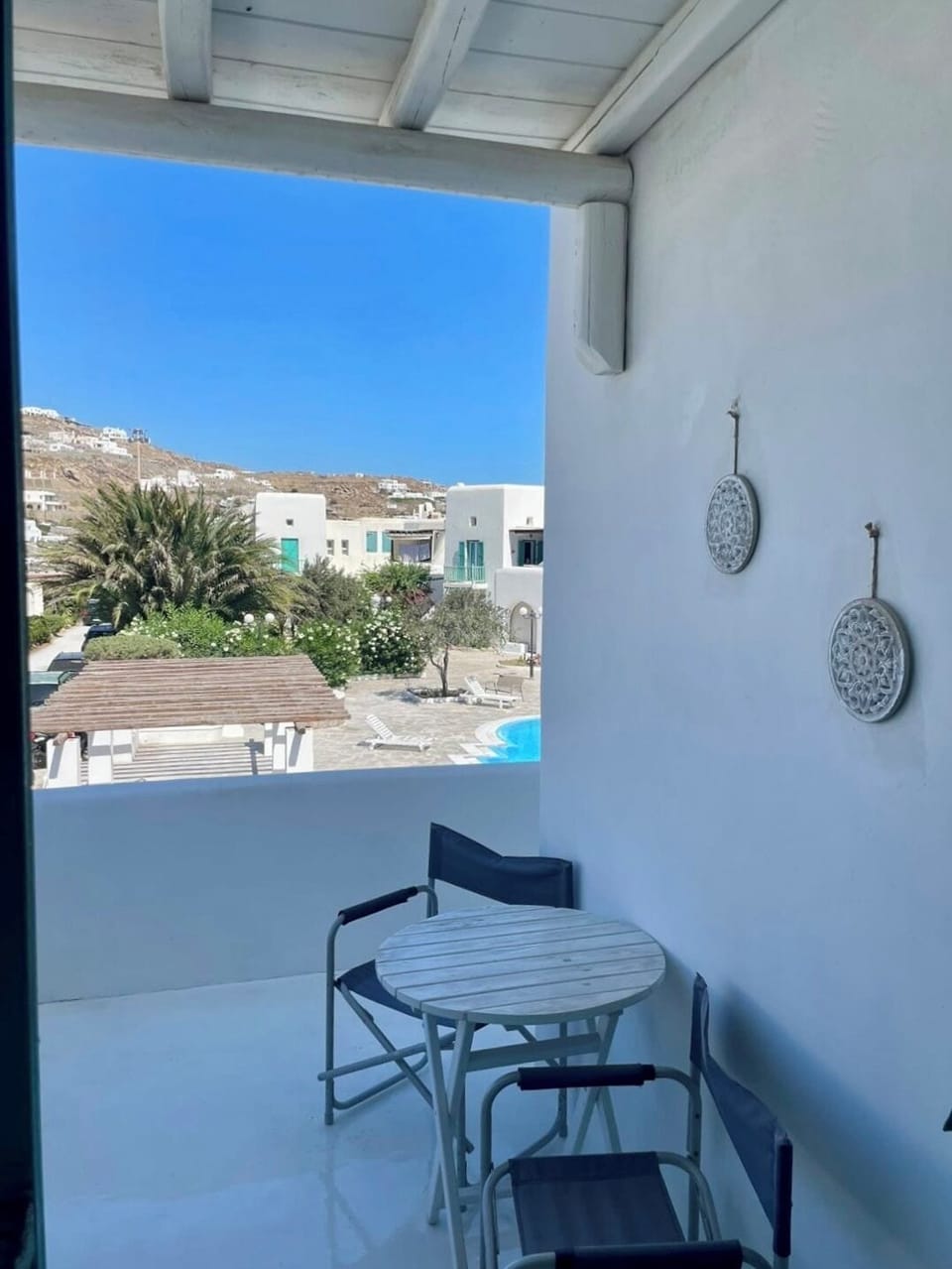 A balcony with invigorating pool views to refresh and inspire.