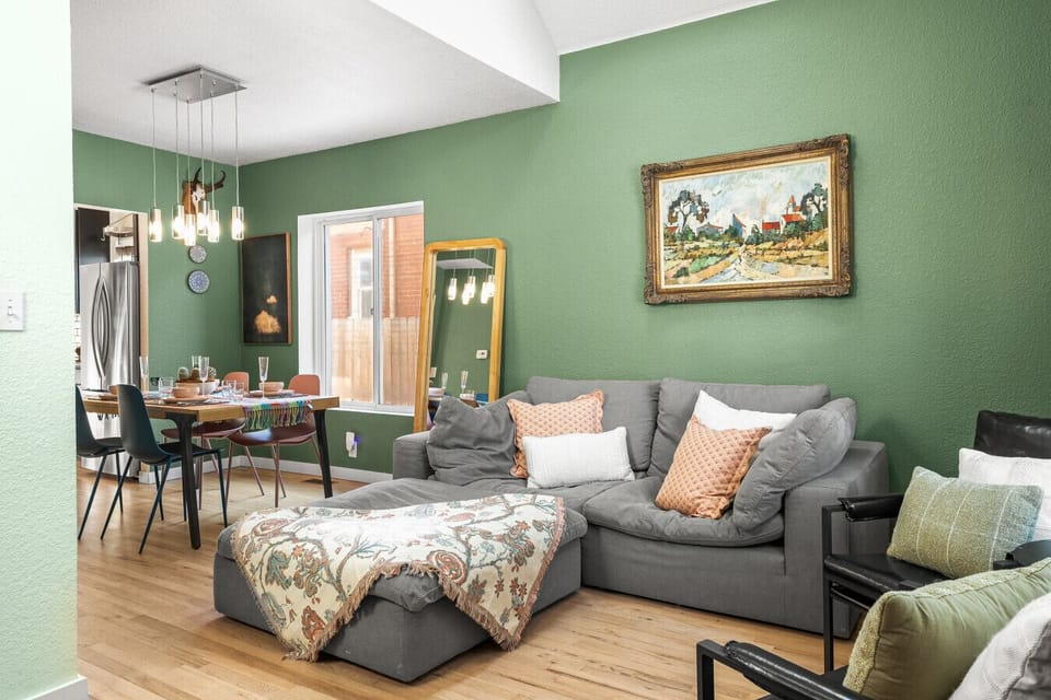 Upon entering you`ll be greeted by vaulted ceilings, natural light, and the perfect couch to plop down on after a long day of traveling