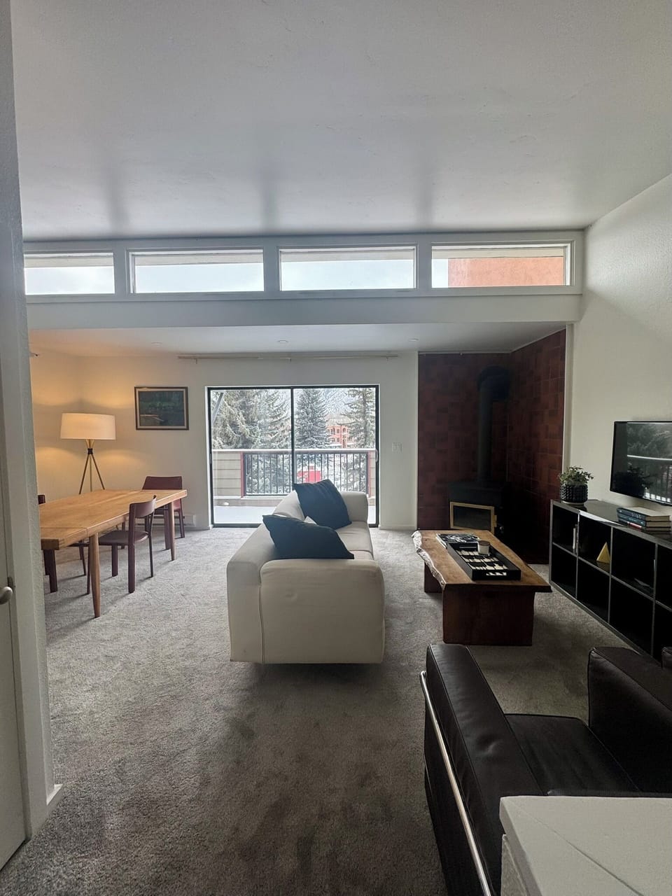 living room , real wood fireplace , cable TV, deck