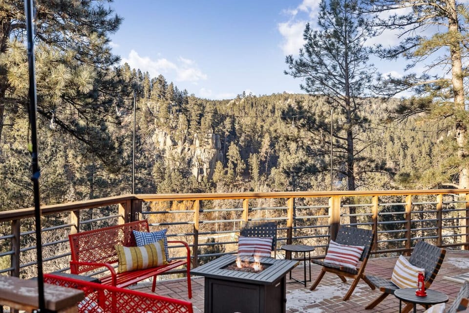 Gather outside around the fire pit and enjoy dining under the stars.