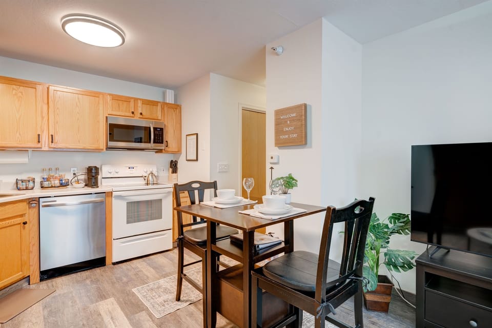 Open and airy layout connecting the dining and living areas, perfect for socializing and relaxing.