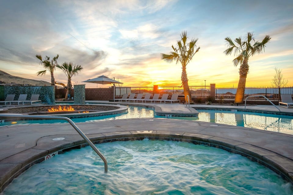 Unwind at the resort pool, lazy river, hot tub, and fire pit & sunset views