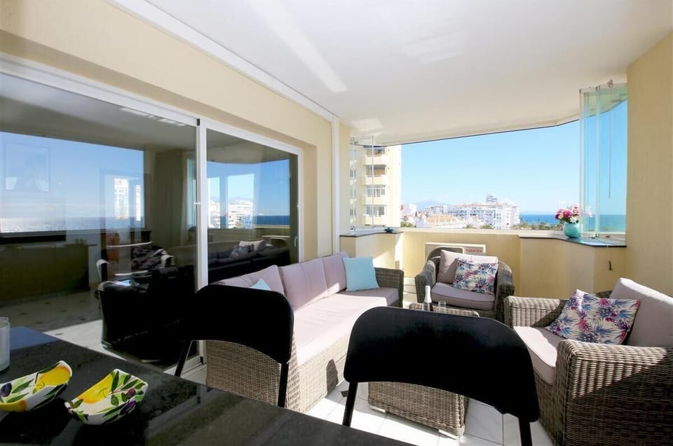 Terrace view from the kitchen with serving bar with seating for two guests