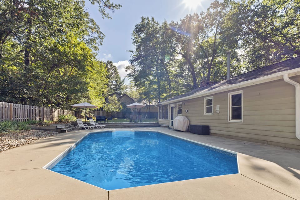 Heated pool with chairs and tables