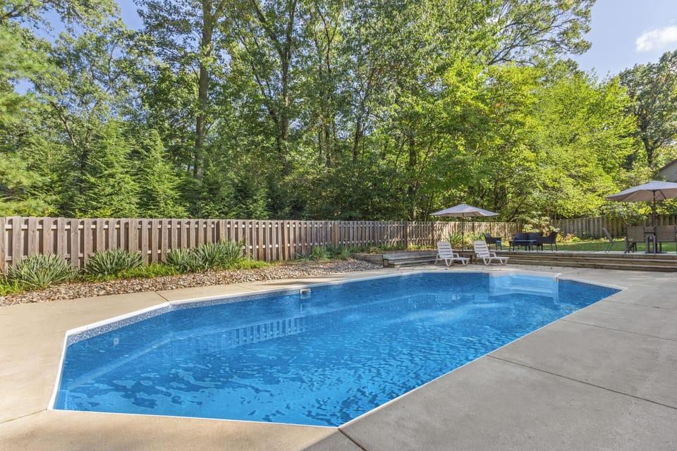 Heated pool with fully fenced yard.