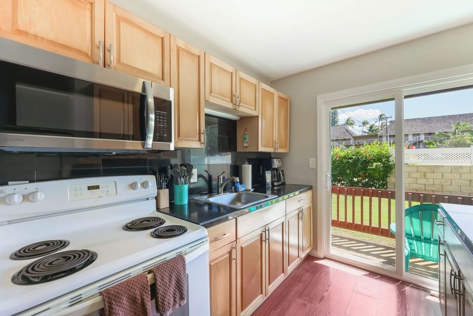 From morning coffee, to dinner at home- enjoy a fully equipped kitchen, brand new dishwasher and private lanai access